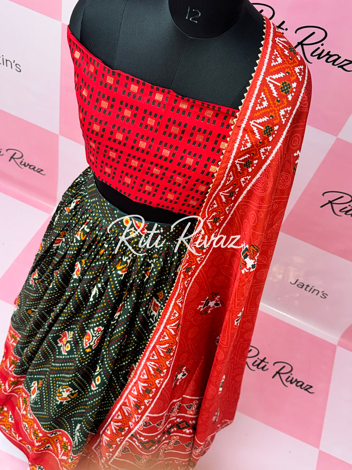 Green color Tussar Silk Patola and Bandhani Print with foil work Fully Lehenga choli