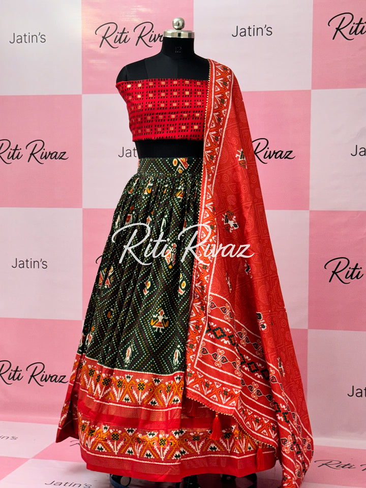 Green color Tussar Silk Patola and Bandhani Print with foil work Fully Lehenga choli