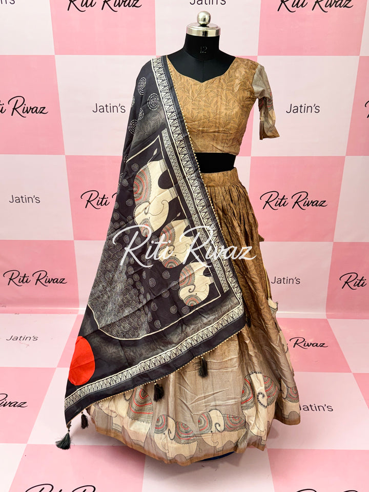 Copper Color Manipuri Silk Kalamkari Contrast Border Print Lehenga Choli