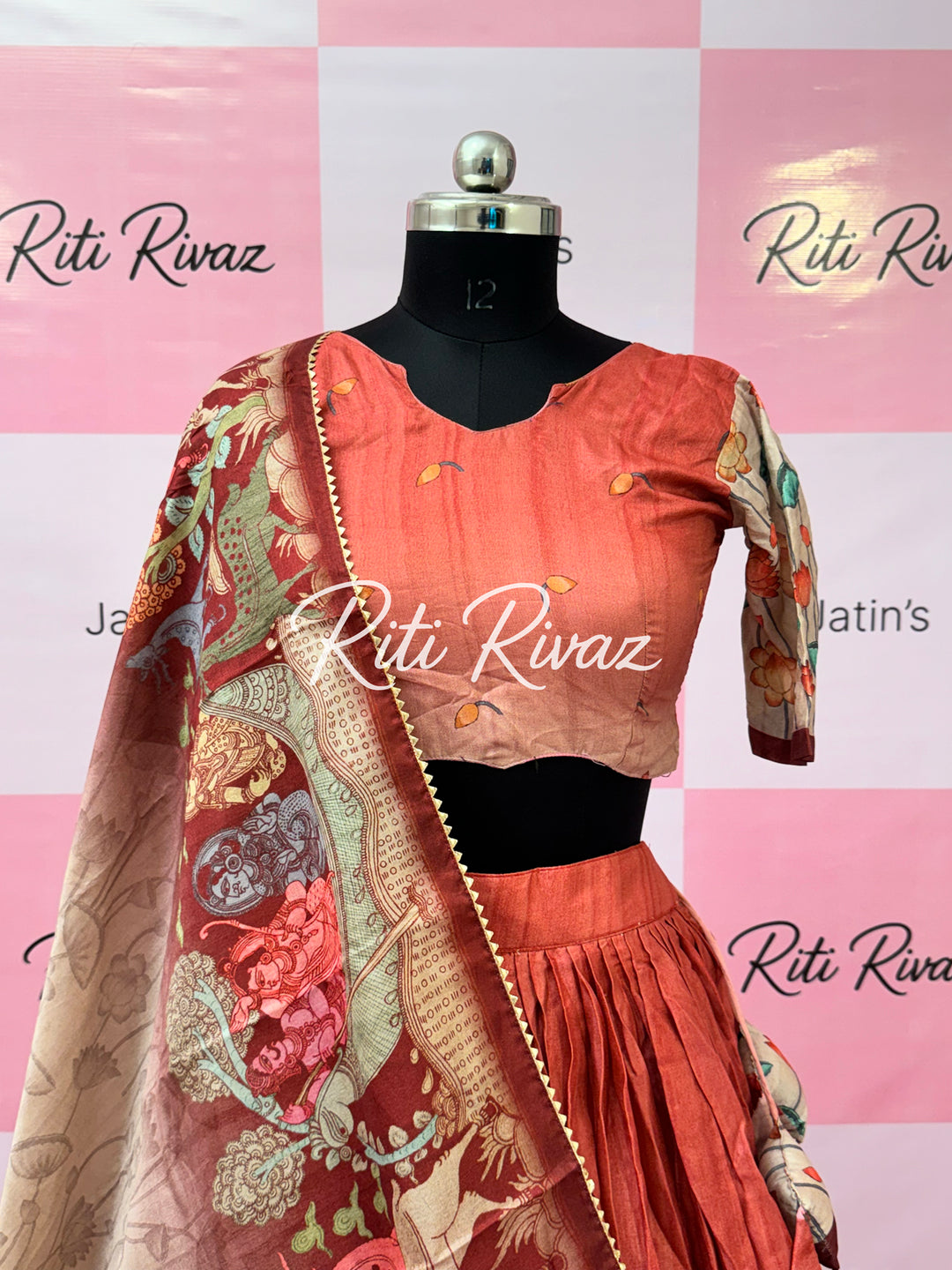 Gajari Color Manipuri Silk Kalamkari Contrast Border Print Lehenga Choli