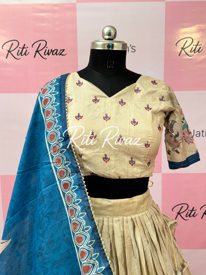 Beige Color Manipuri Silk Kalamkari Contrast Border Print Lehenga Choli