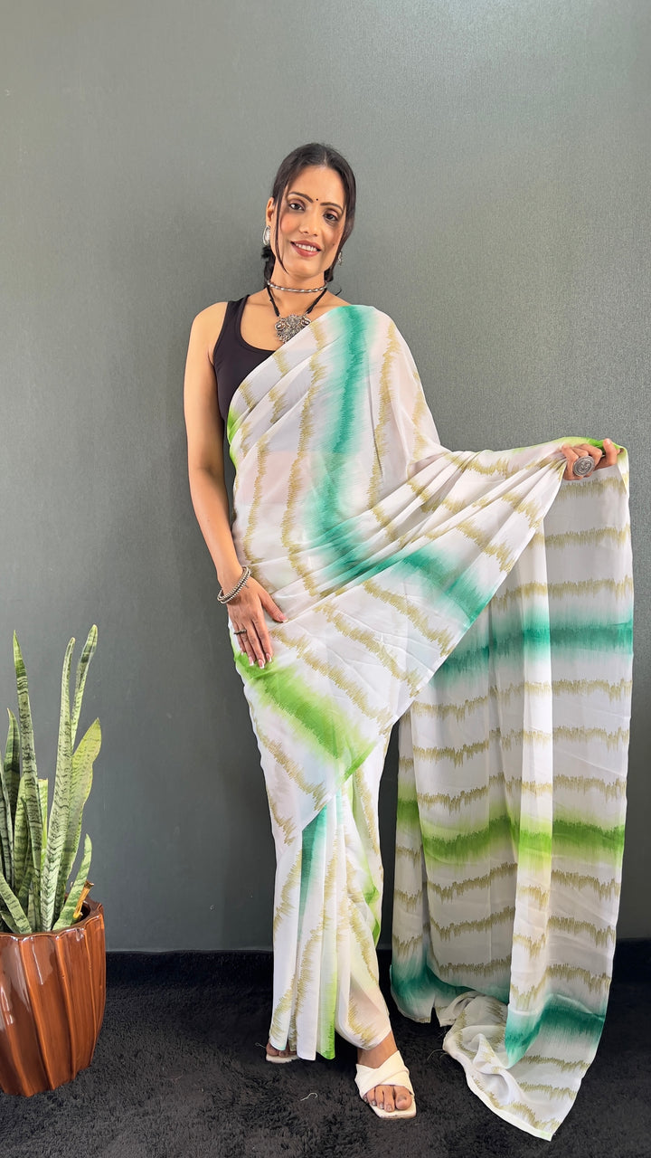 Green Color Rangoli Silk Saree With Beautiful Blouse