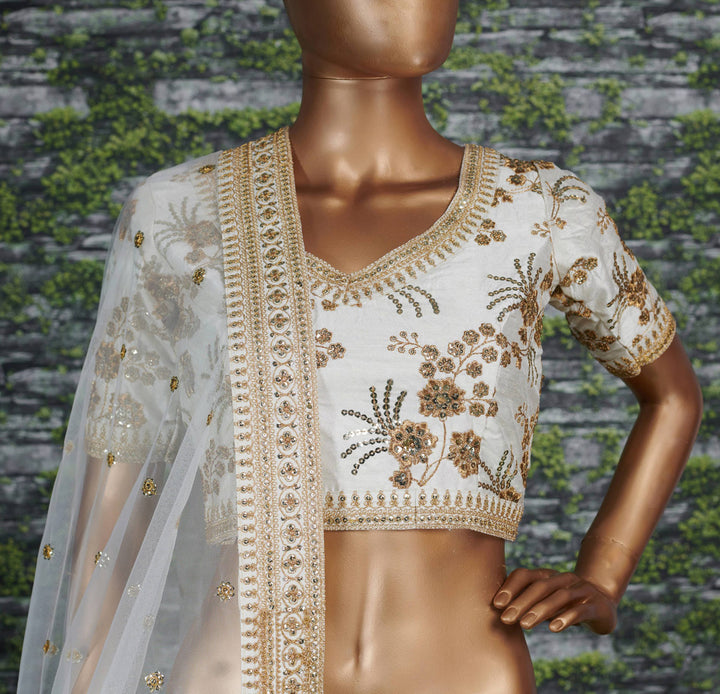 Off-White Color Thai Silk With Zari And Sequins Embroiderey Work Lehenga Choli