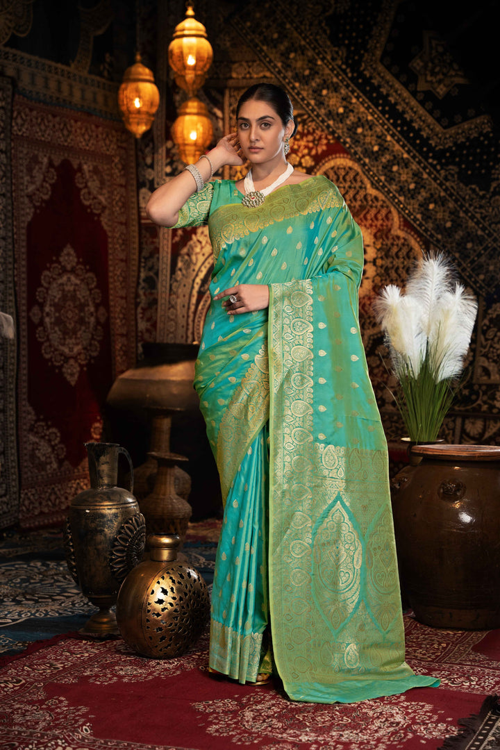 Green Color Banarasi Silk Saree With Zari Woven Design.