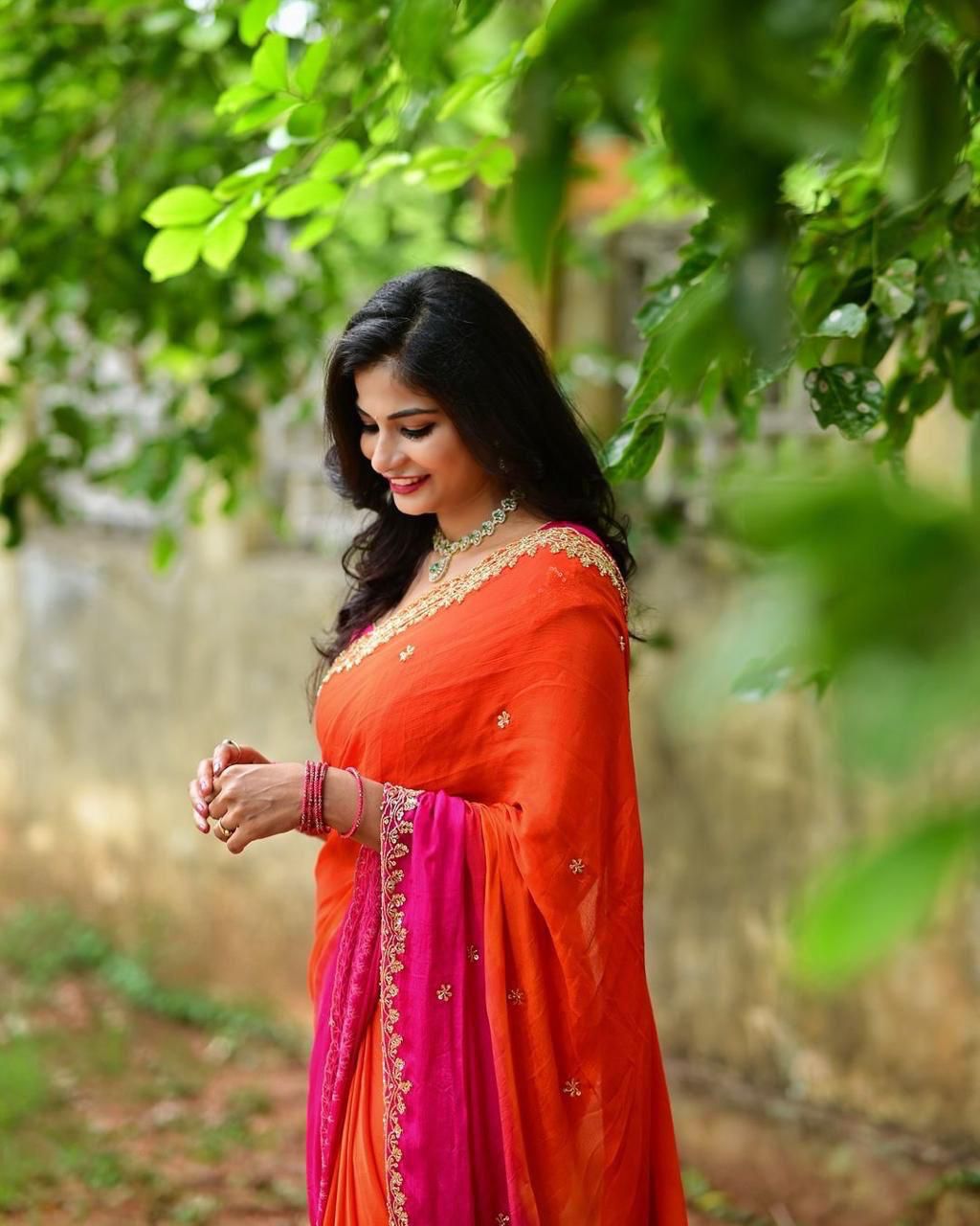 Orange Color Chinnon Saree With Embroidery Sequins And Jari Work And Border Arca With Unstitched Blouse Piece
