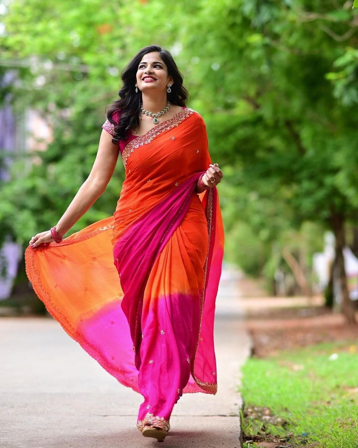 Orange Color Chinnon Saree With Embroidery Sequins And Jari Work And Border Arca With Unstitched Blouse Piece