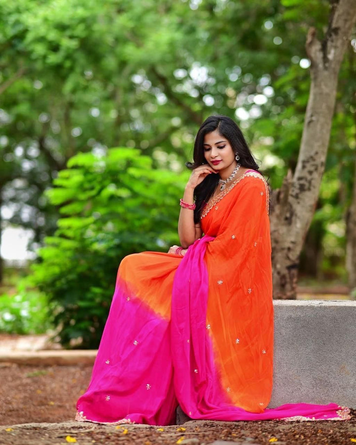 Orange Color Chinnon Saree With Embroidery Sequins And Jari Work And Border Arca With Unstitched Blouse Piece