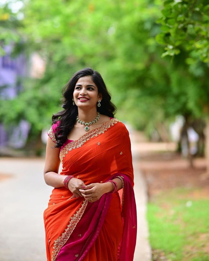Orange Color Chinnon Saree With Embroidery Sequins And Jari Work And Border Arca With Unstitched Blouse Piece
