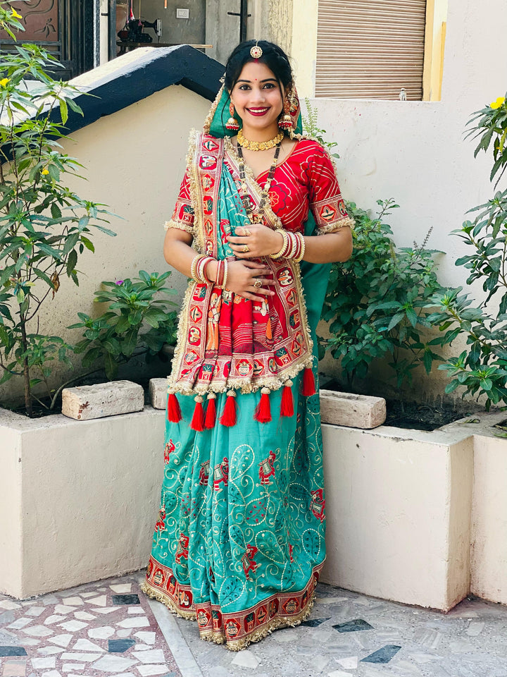 Teal Greenish-Blue Colour Vat Savitri Special Embroidered Saree